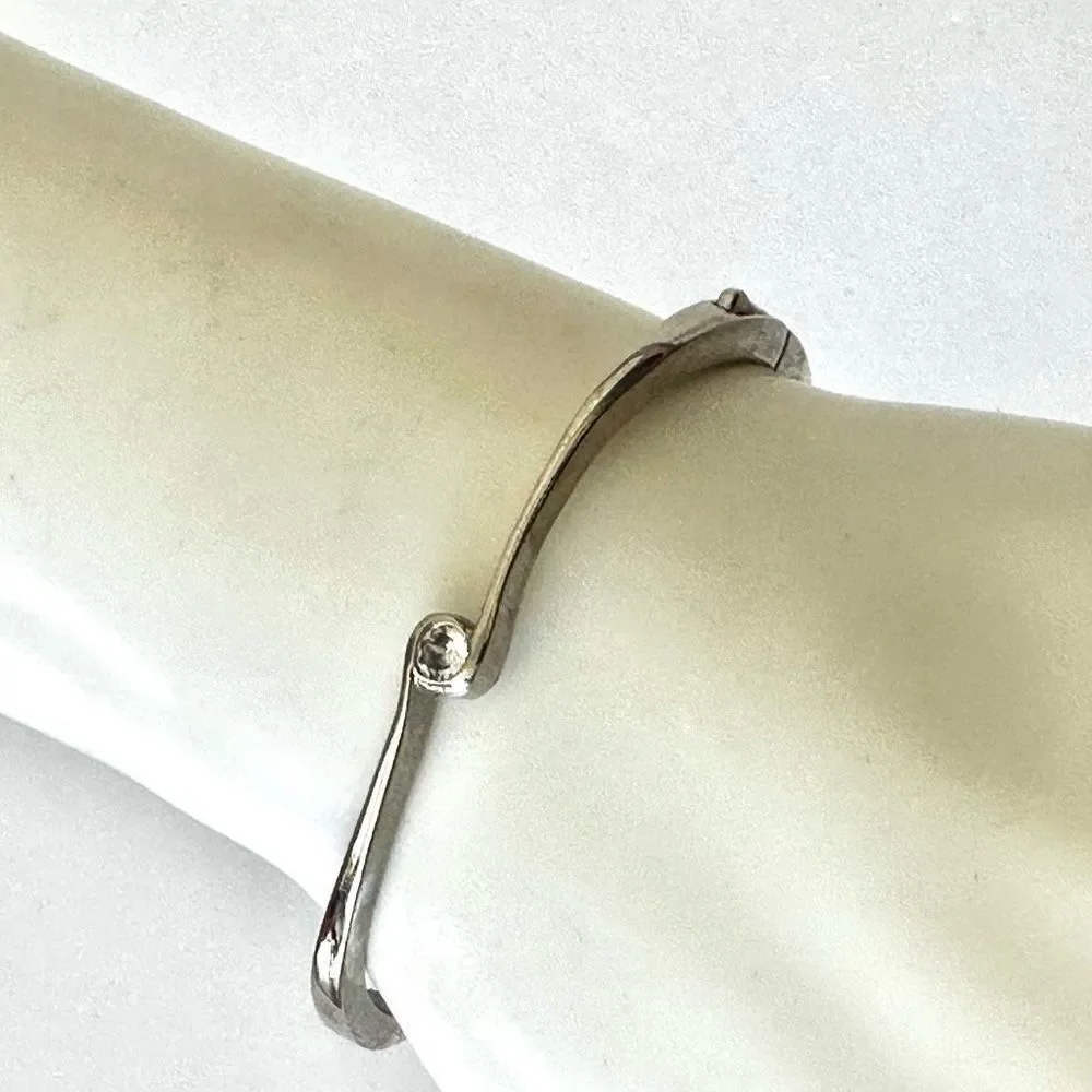 Silver tone rhinestone bangle bracelet